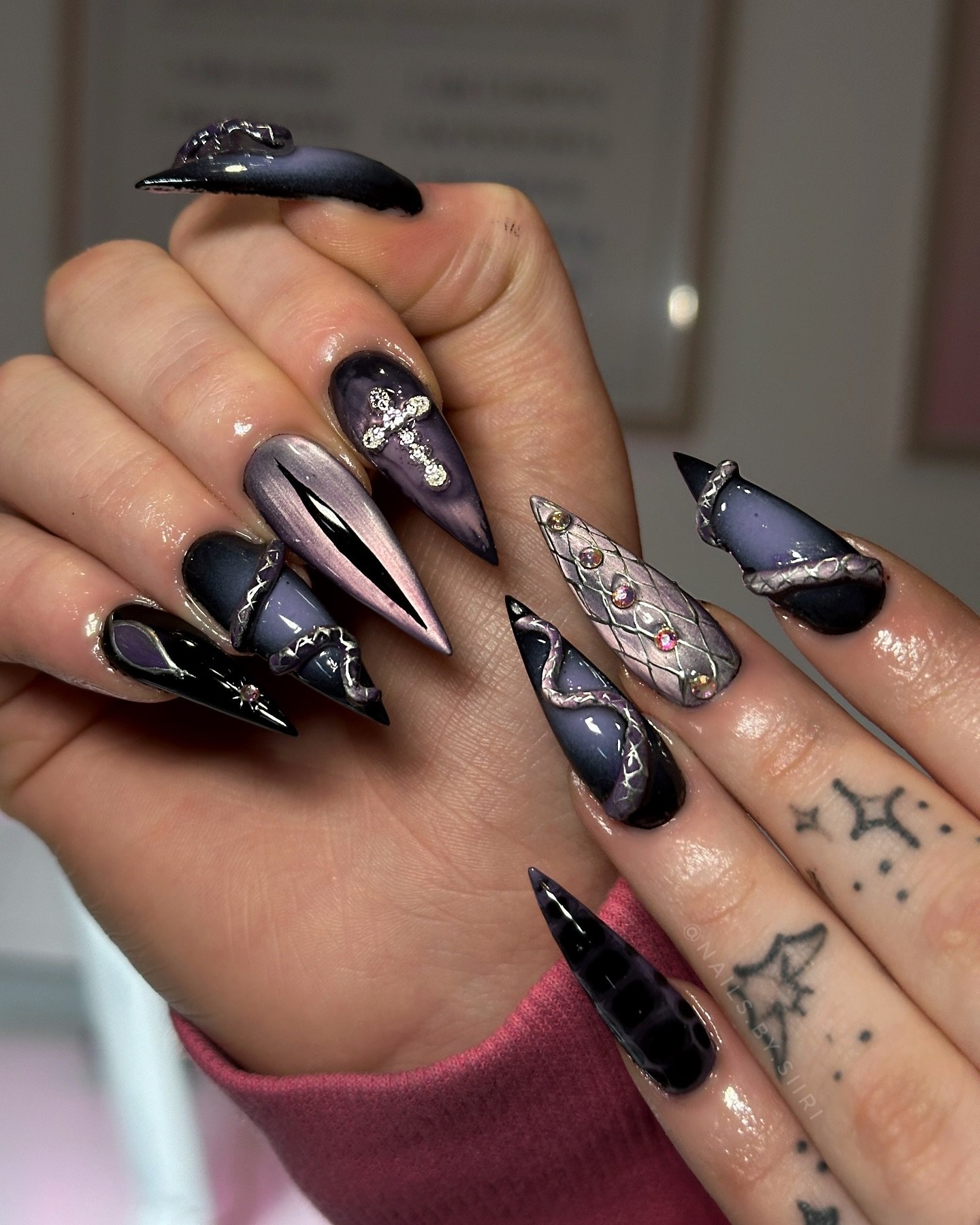 Black Snakeskin Stiletto Nails with Silver Accents