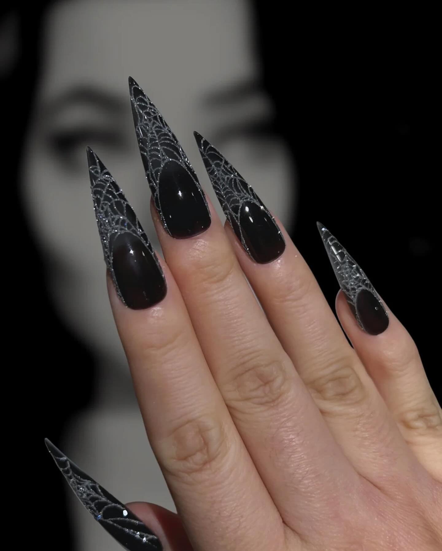 Black Stiletto Nails with Silver Web Detailing