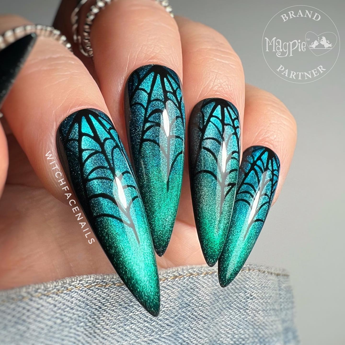 Turquoise Spider Web Stiletto Nails