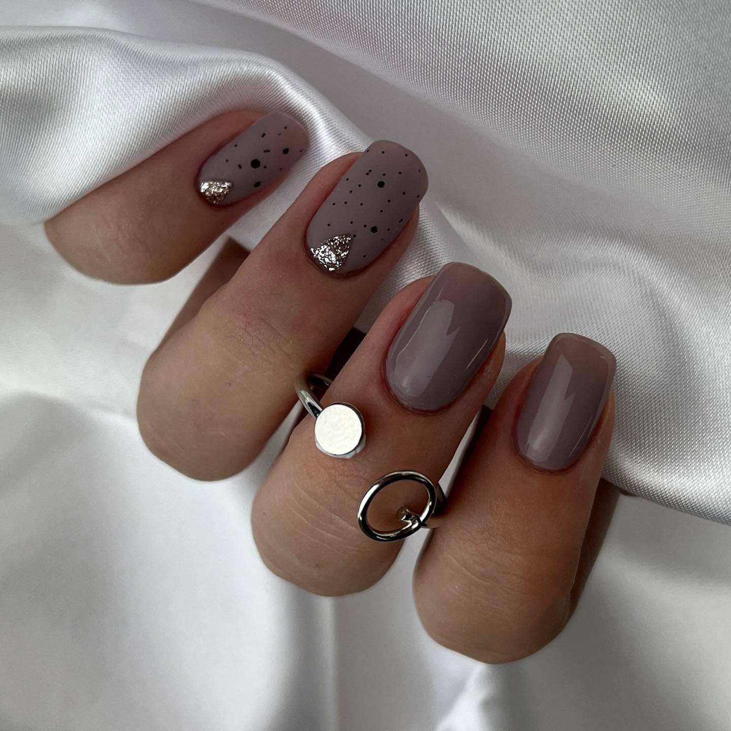 Short Glossy Taupe Nails with Tiny Speckled Accents
