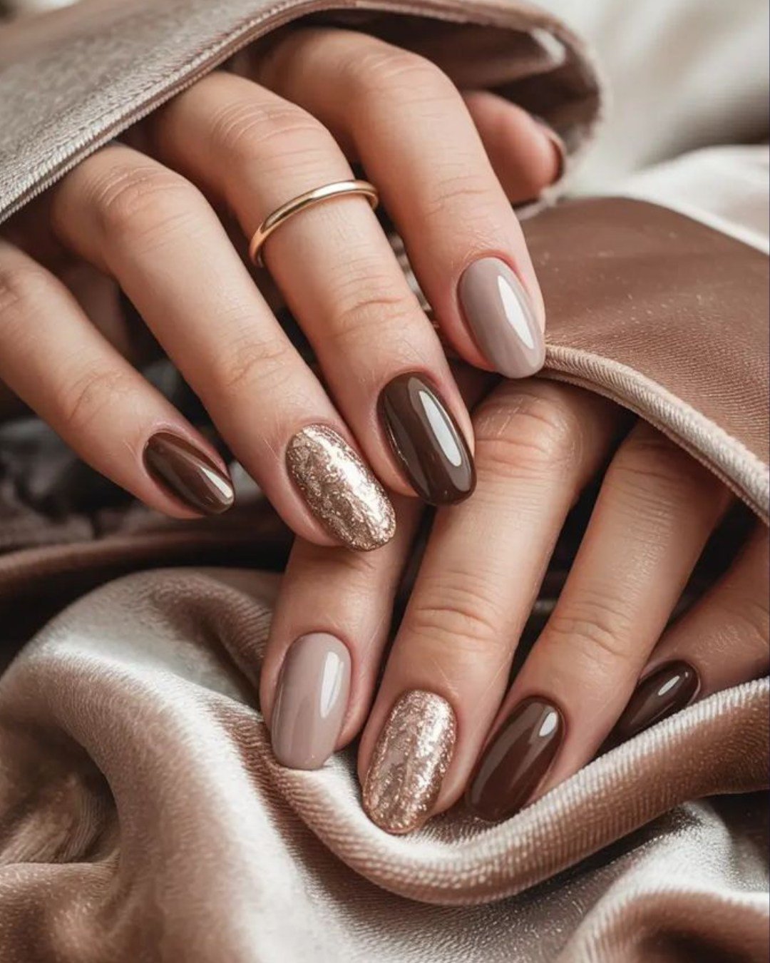 Taupe Almond Nails with Silver Shimmer Accents