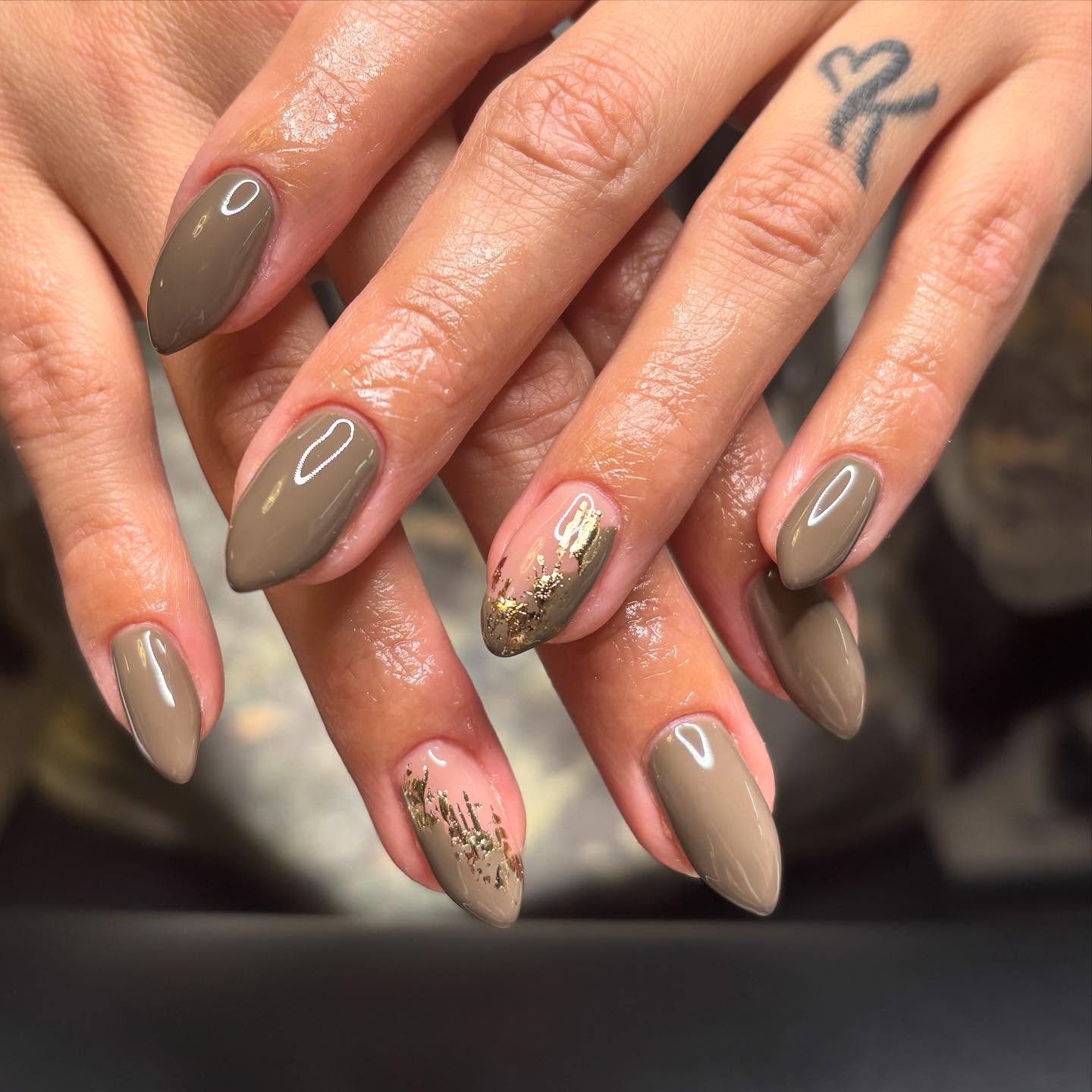 Long Taupe Almond Nails with Delicate Metallic Details