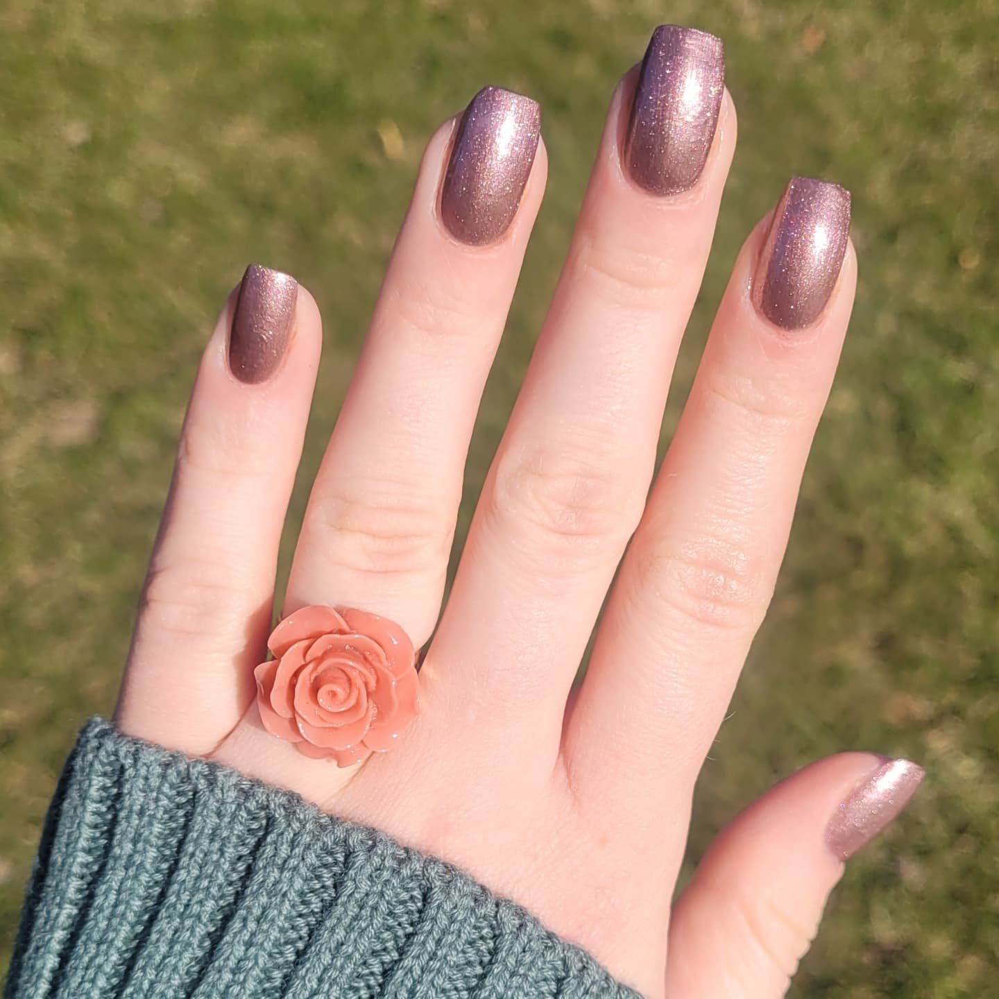 Long Mauve-Taupe Nails with a Rose Accent