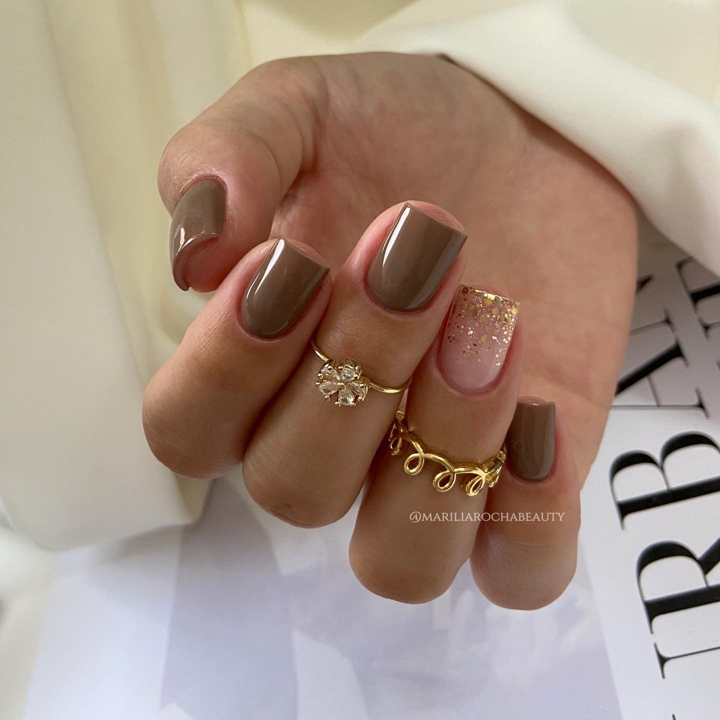 Taupe Nails with Gold Chain and Floral Details