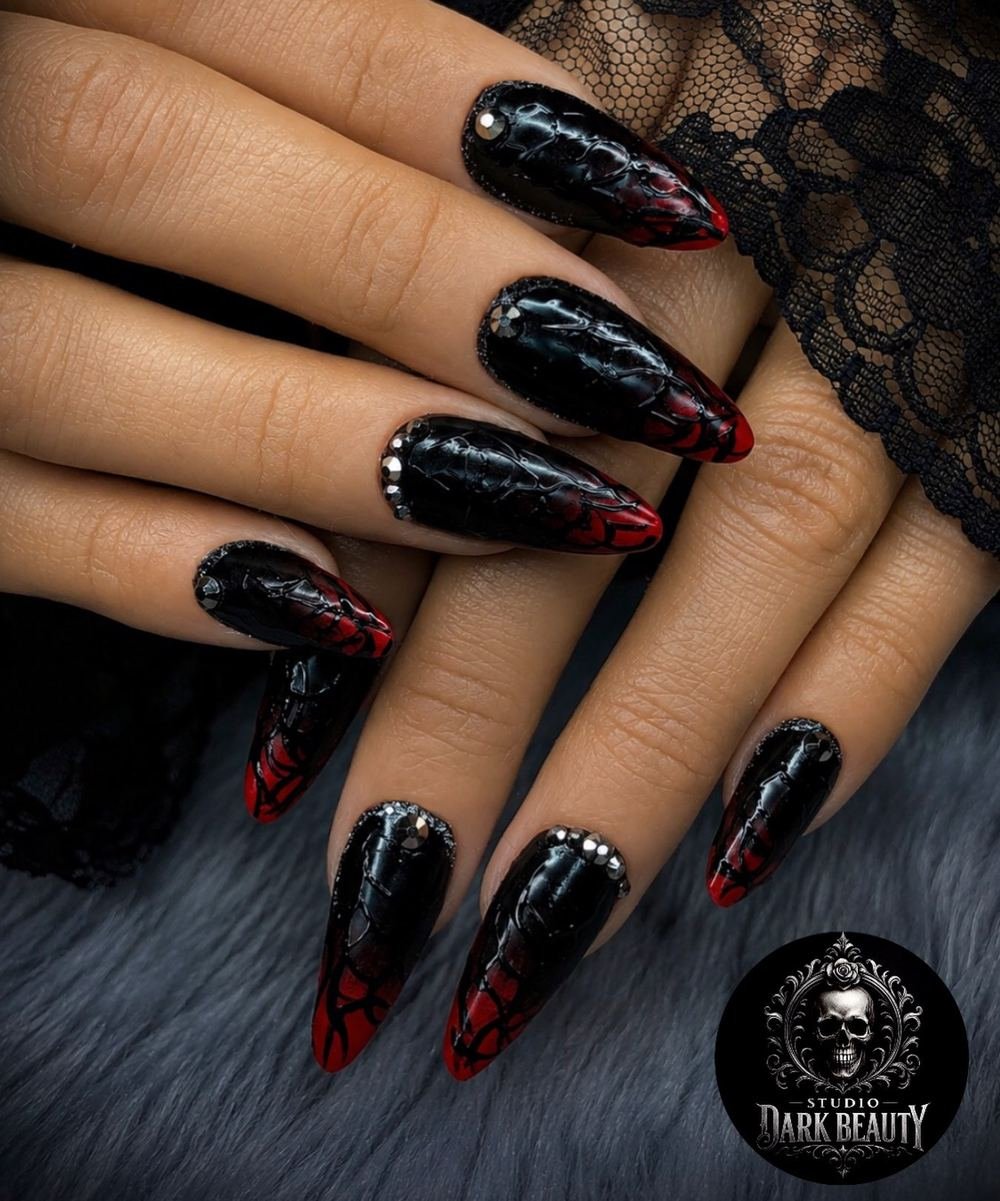 Black Glossy Nails with Red Flame-Like Tips