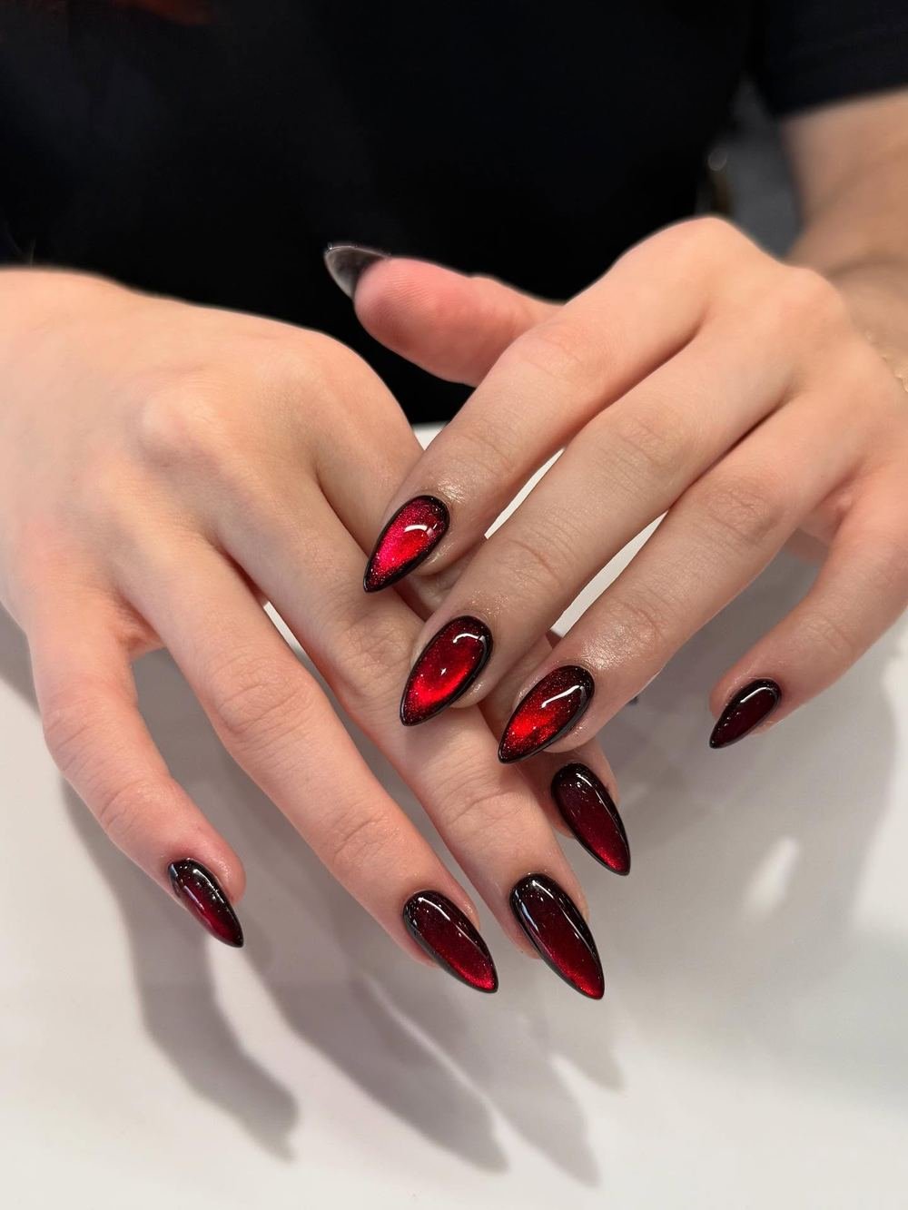 Glossy Black and Red Almond Nails