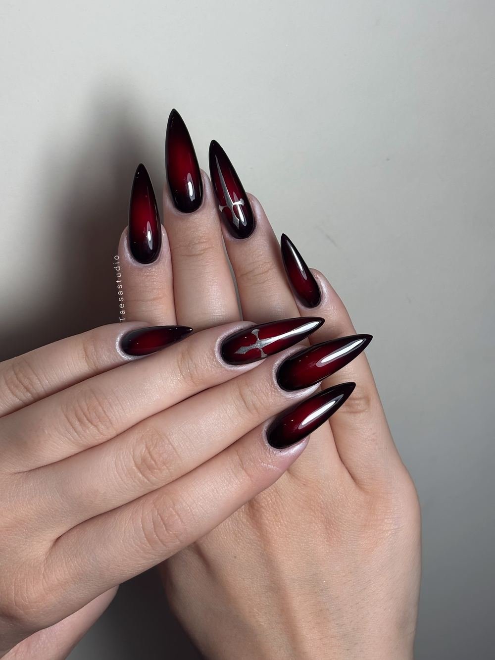 Deep Burgundy Stiletto Nails with Clean Glossy Finish