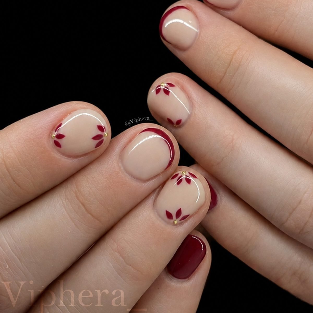 Milky Nude Nails with Tiny Red Floral Accents