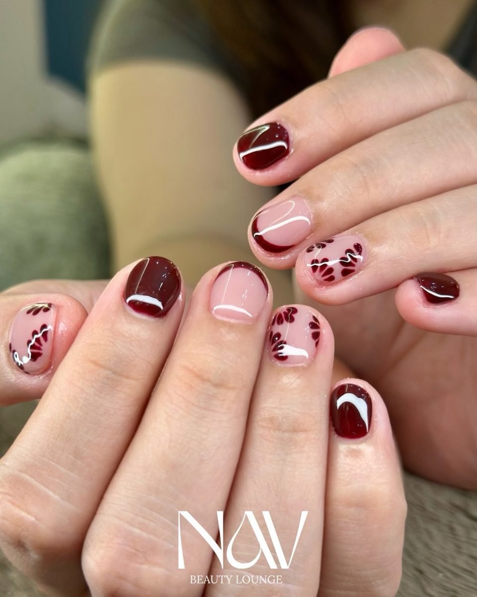 Burgundy and Blush Pink Short Nails with Floral Accents