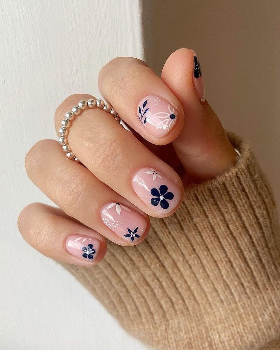 Pink Short Nails with Blue Floral Accents