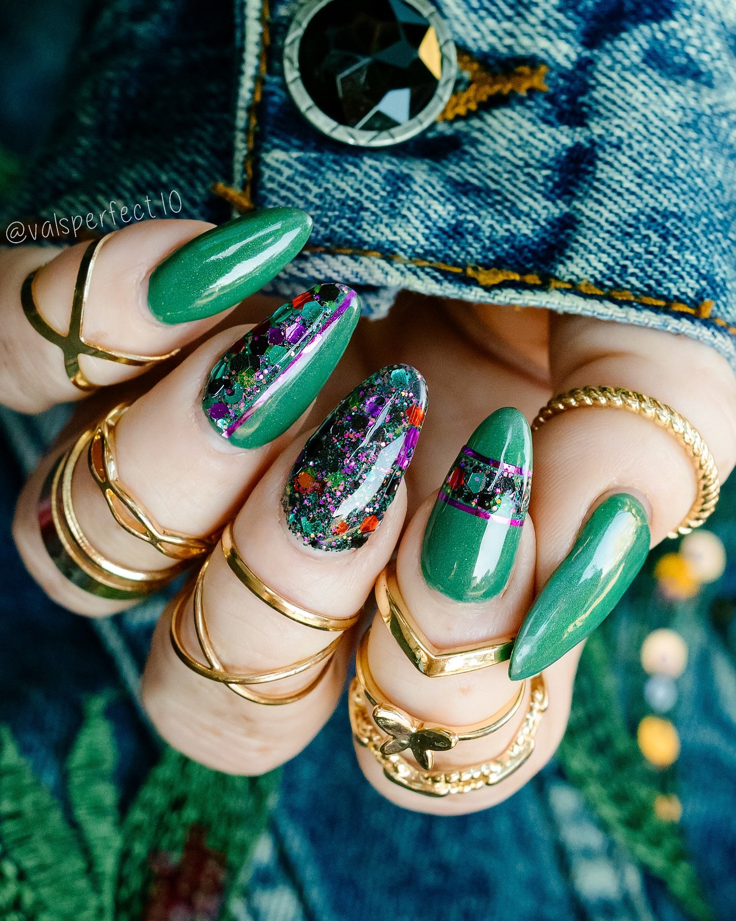 Emerald Green Nails with Glitter and Graphic Accents