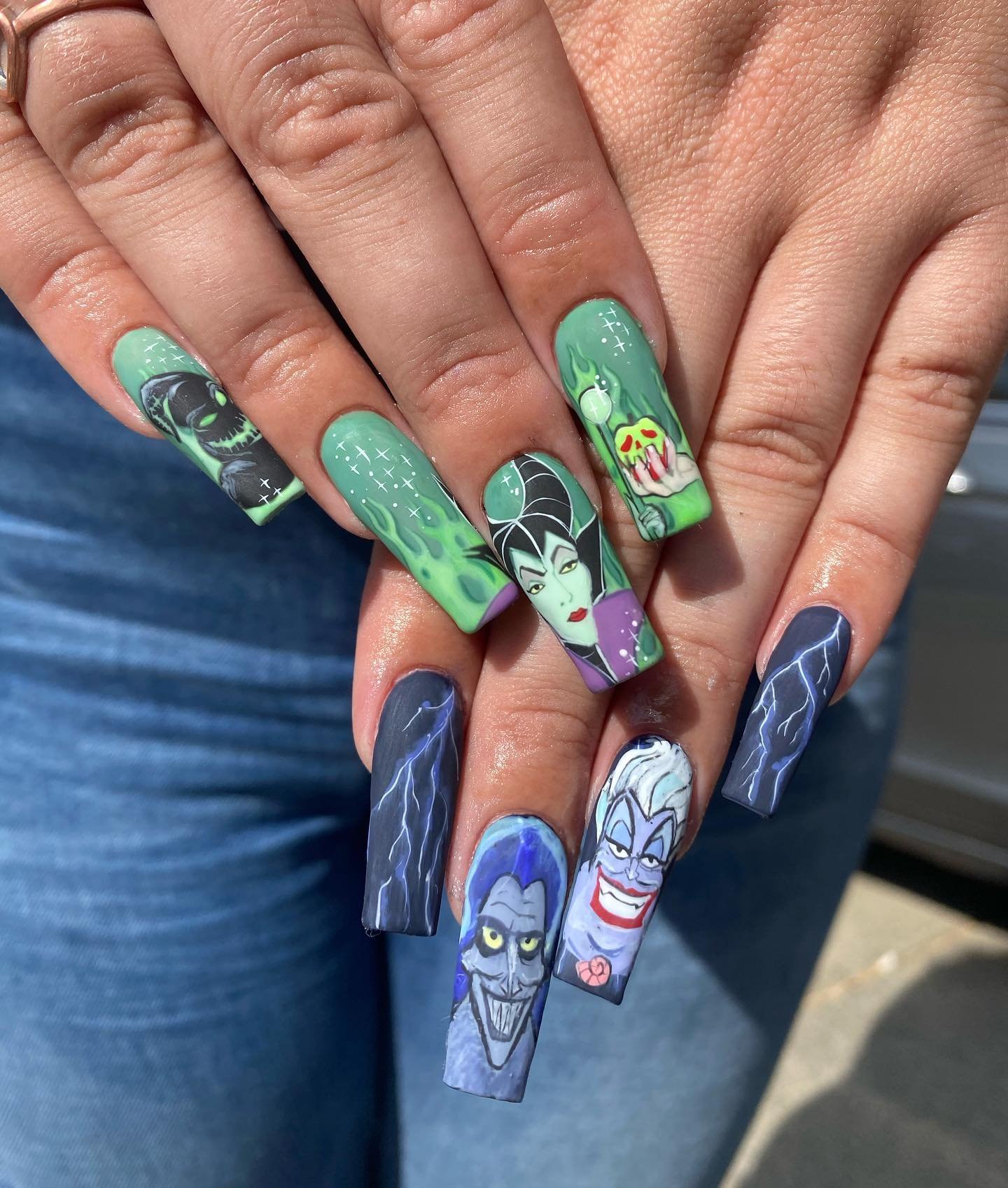 Long Blue-Green Nails with Painted Character Details