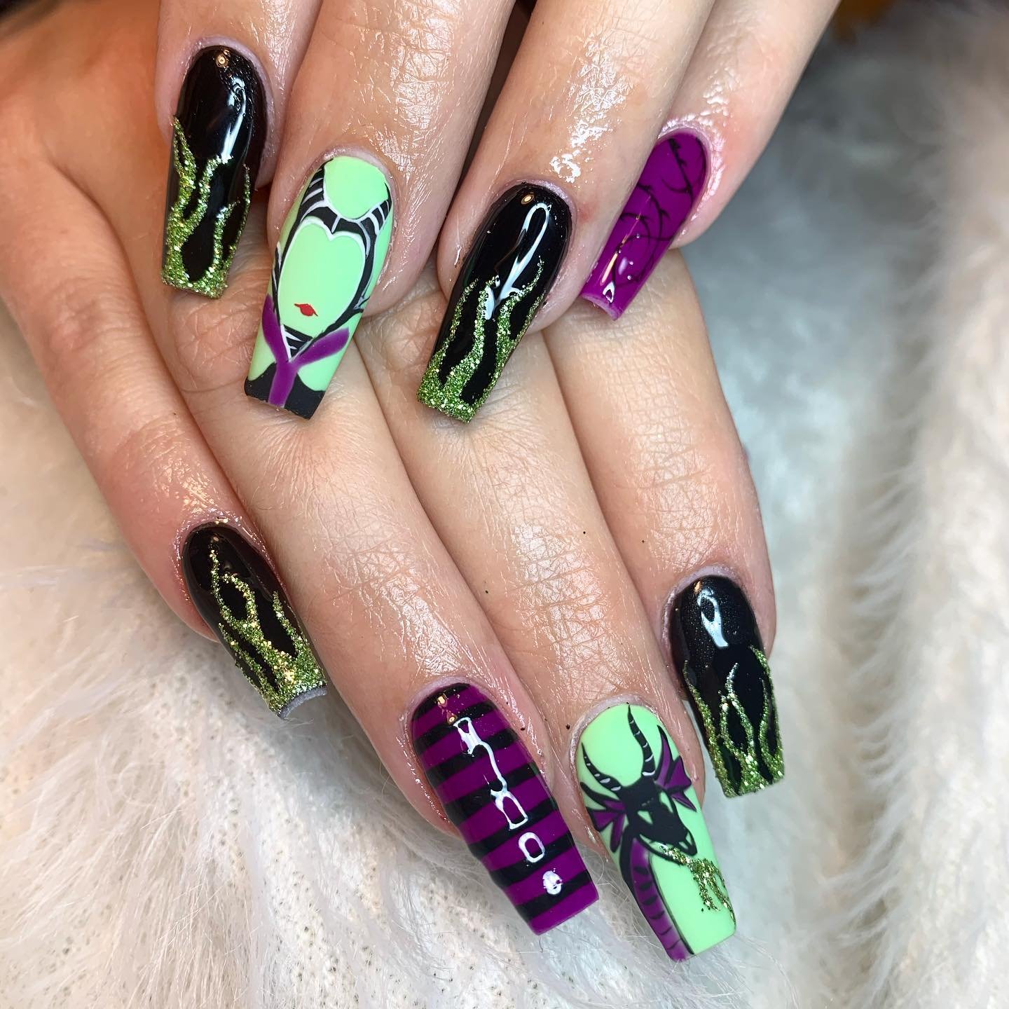 Black and Mint Green Nails with Geometric Accents