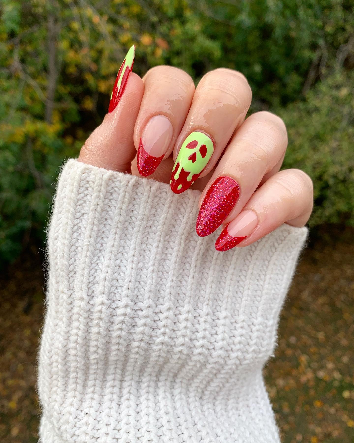 Red and Pink Nails with Character and Graphic Details