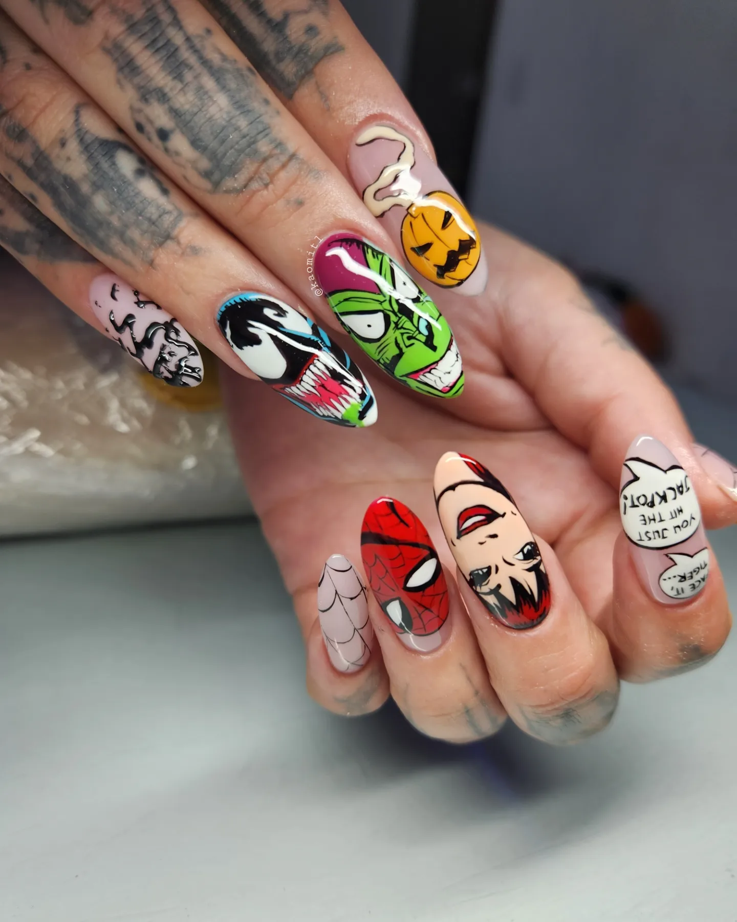Mixed Character and Graphic Nail Art in Bright Colors
