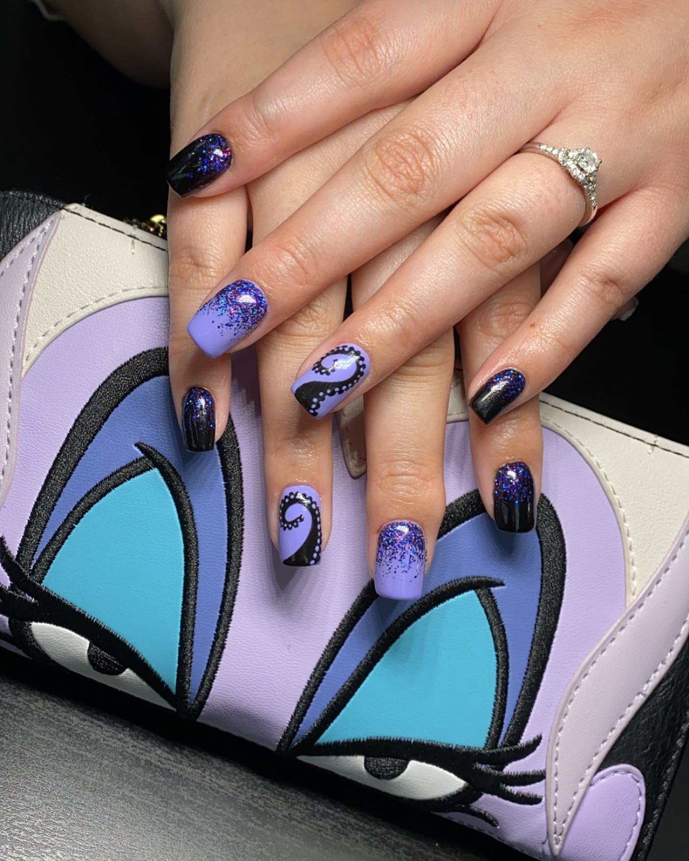 Purple Short Nails with Black and Blue Graphic Panels