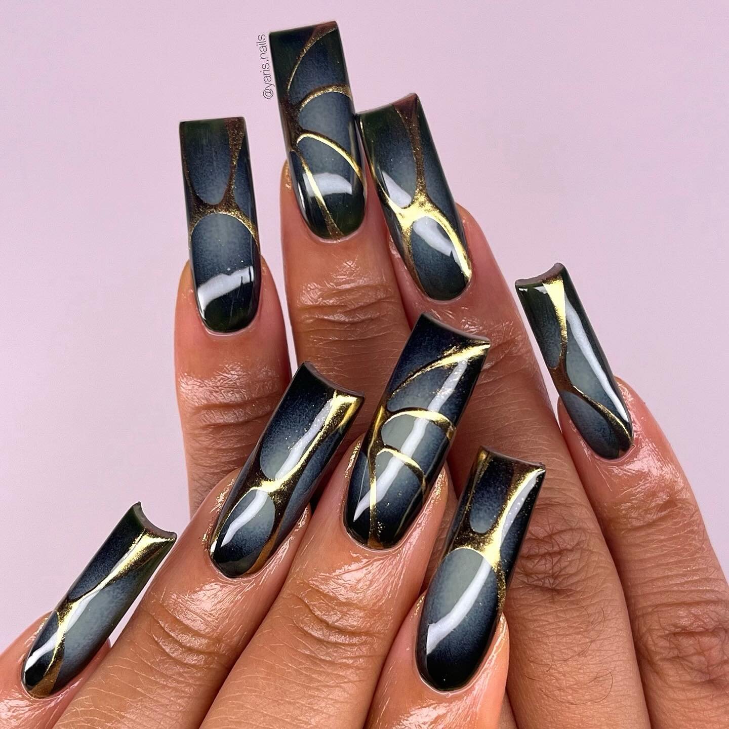 Black and Gold Long Coffin Nails with Graphic Panels
