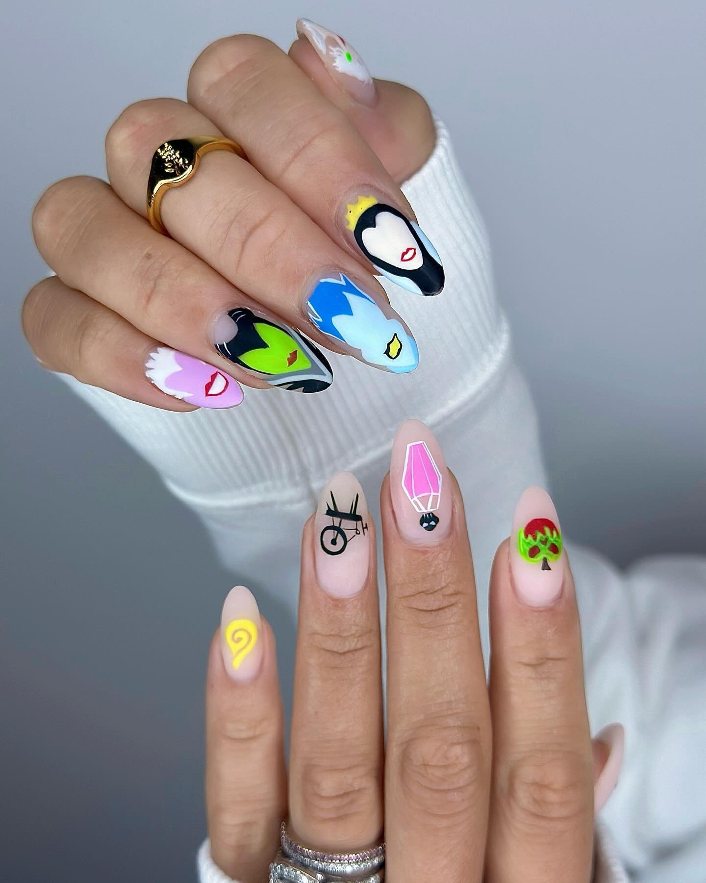 Pastel Multicolor Nails with Tiny Character and Graphic Details