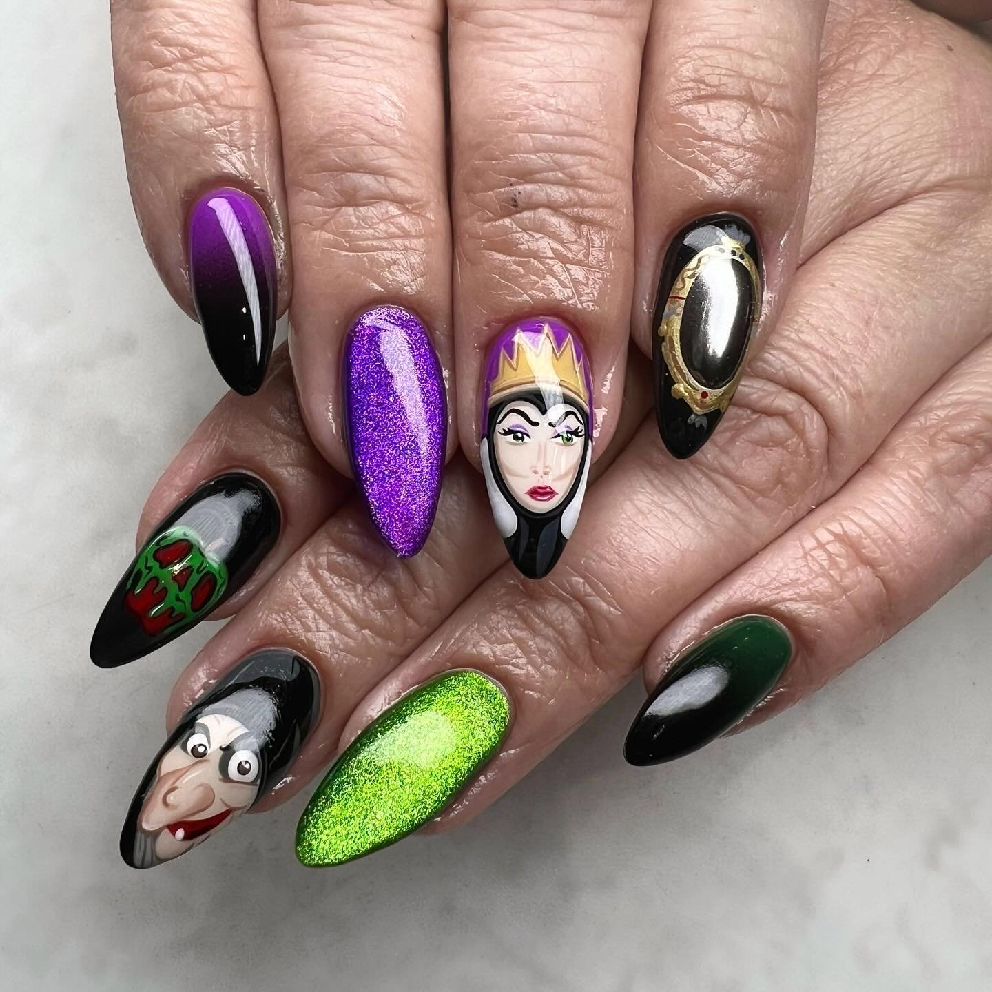 Purple, Black, Green, and White Long Almond Nail Art