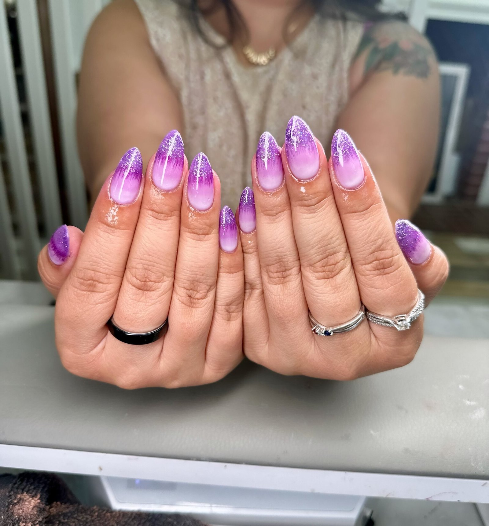 Glossy Pink and Purple Nails with Soft Airbrushed Accents