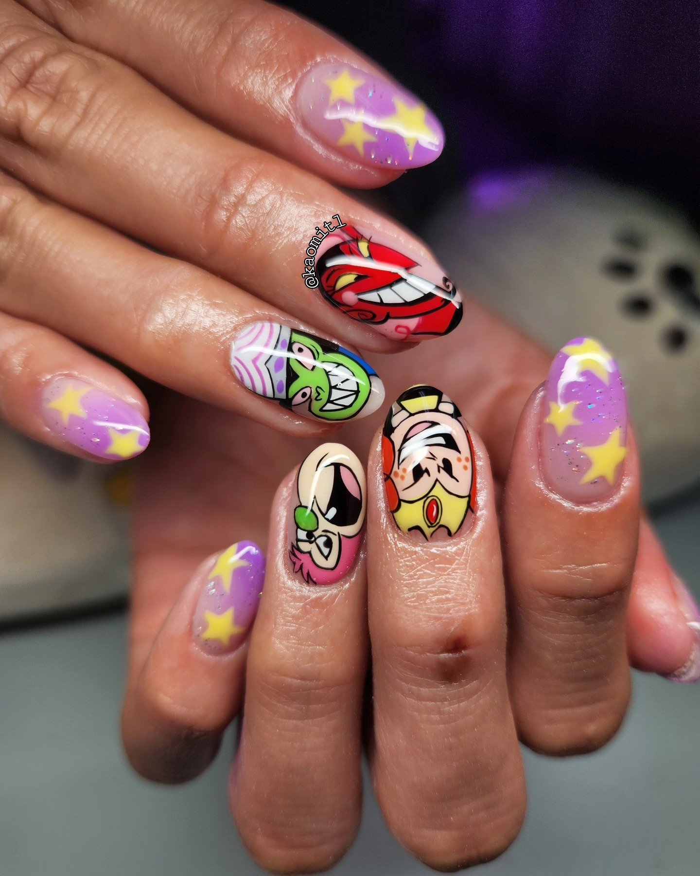 Purple Nails with Colorful Character and Star Details