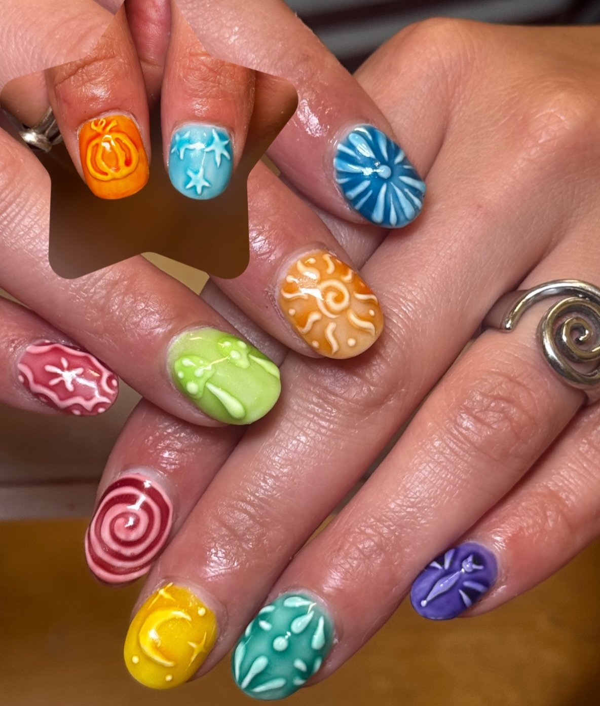 Bright Mismatched Nails with White Swirl and Floral Motifs
