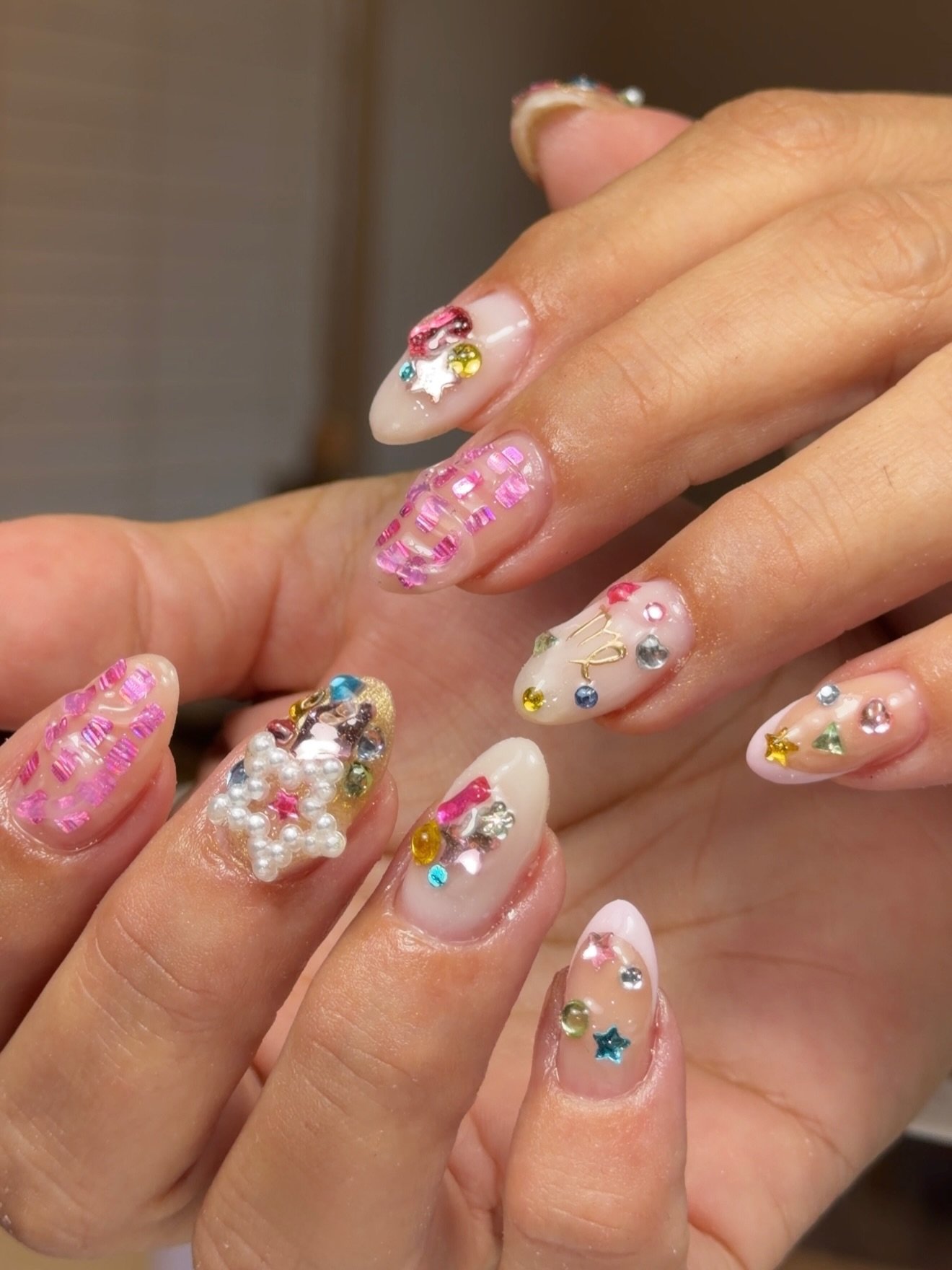 Pink Glitter Almond Nails with 3D Embellishments