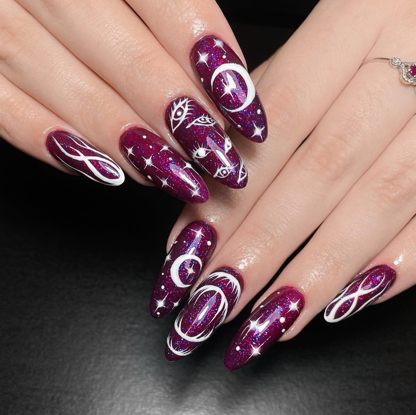 Black Almond Nails with Silver and White Line Art