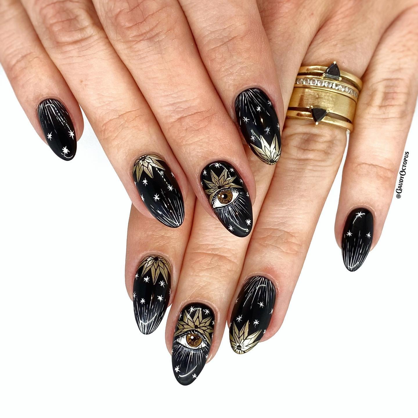 Glossy Purple Almond Nails with Minimal Curved Accents