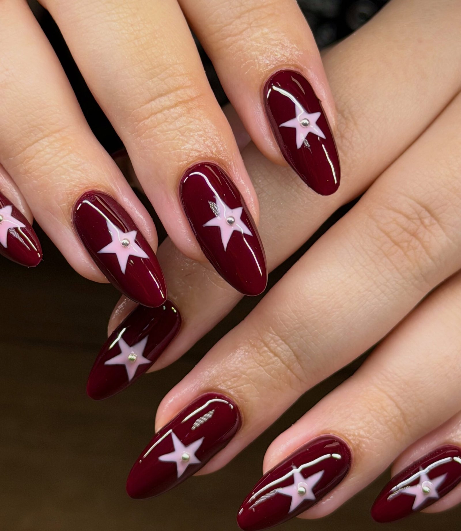 Wine Almond Nails with White Starbursts