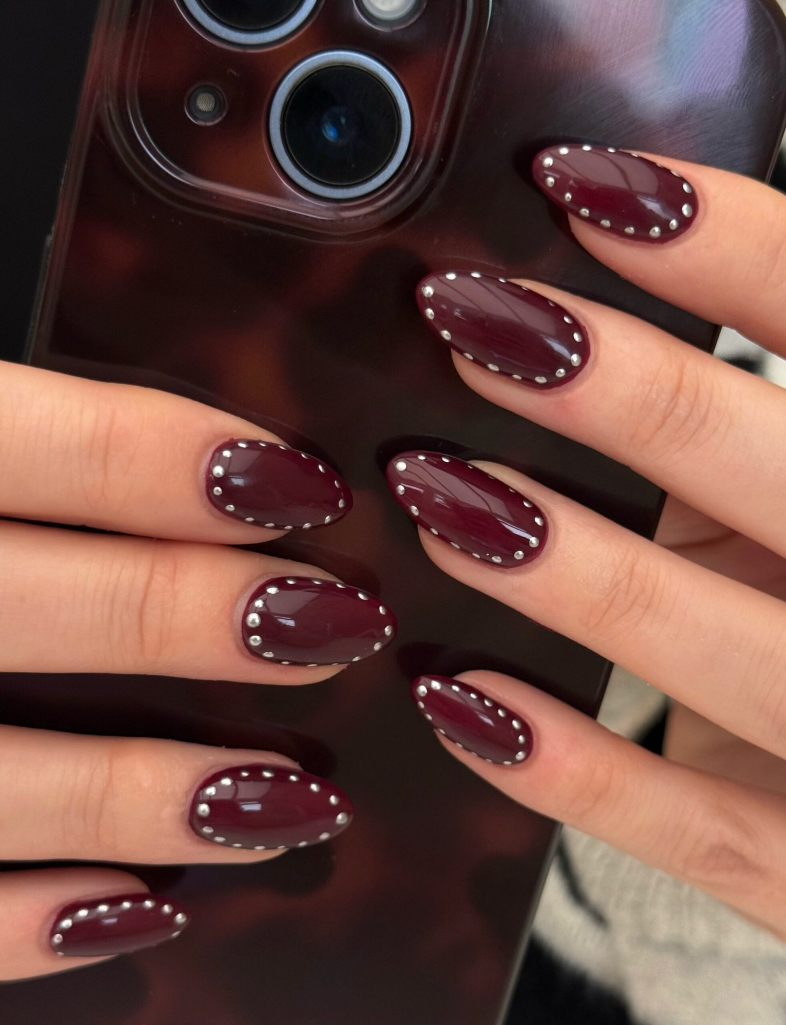 Wine Almond Nails with Pink Shimmer Accents