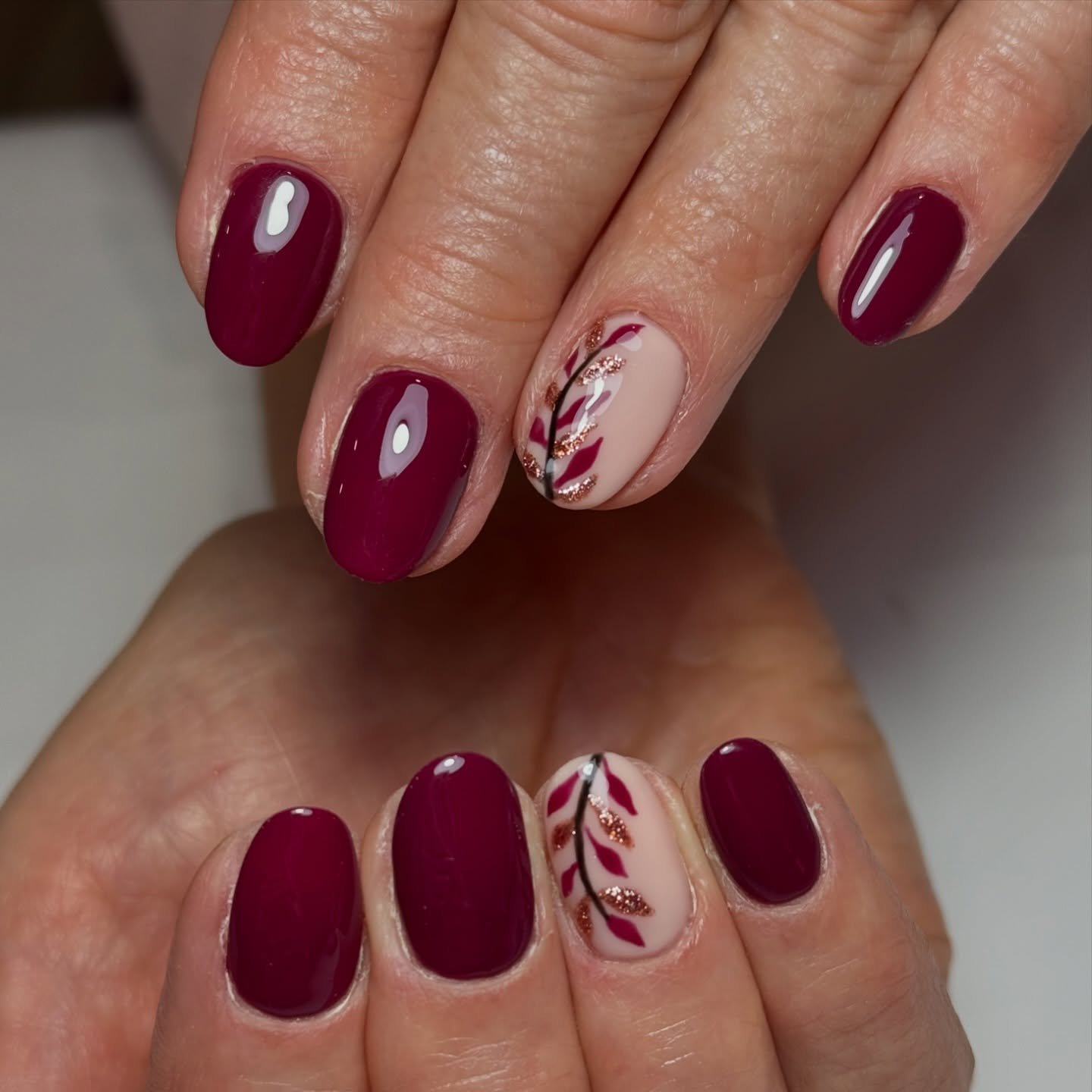 Short Wine Nails with a Candy-Cane Style Accent