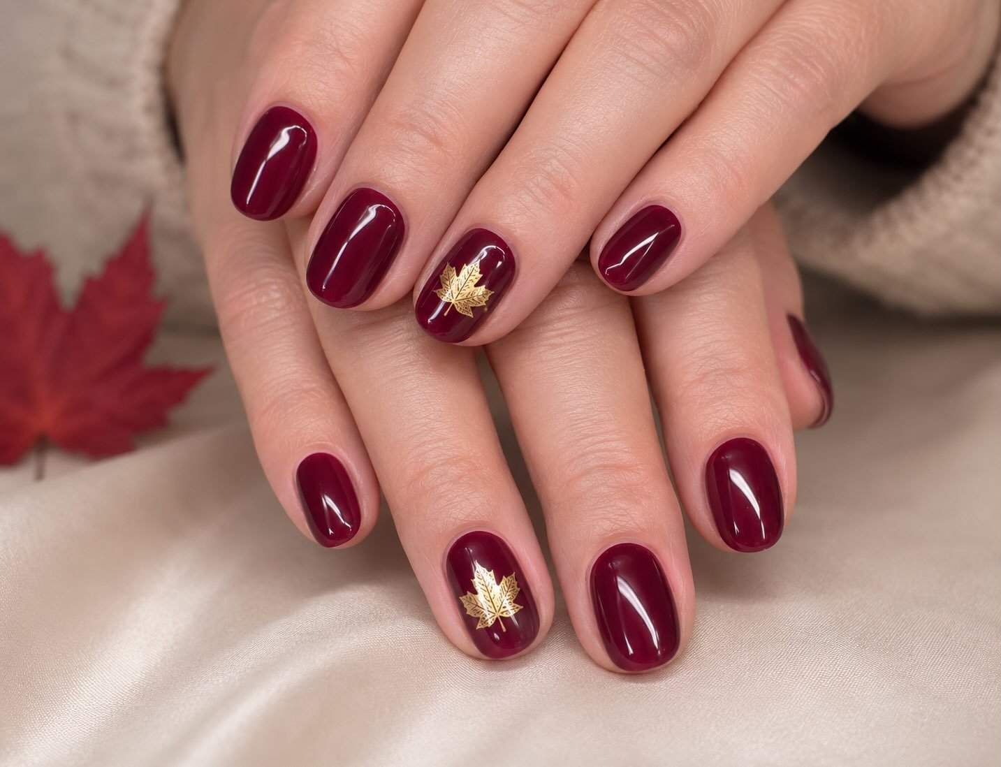 Short Wine Nails with Gold Leaf Accents