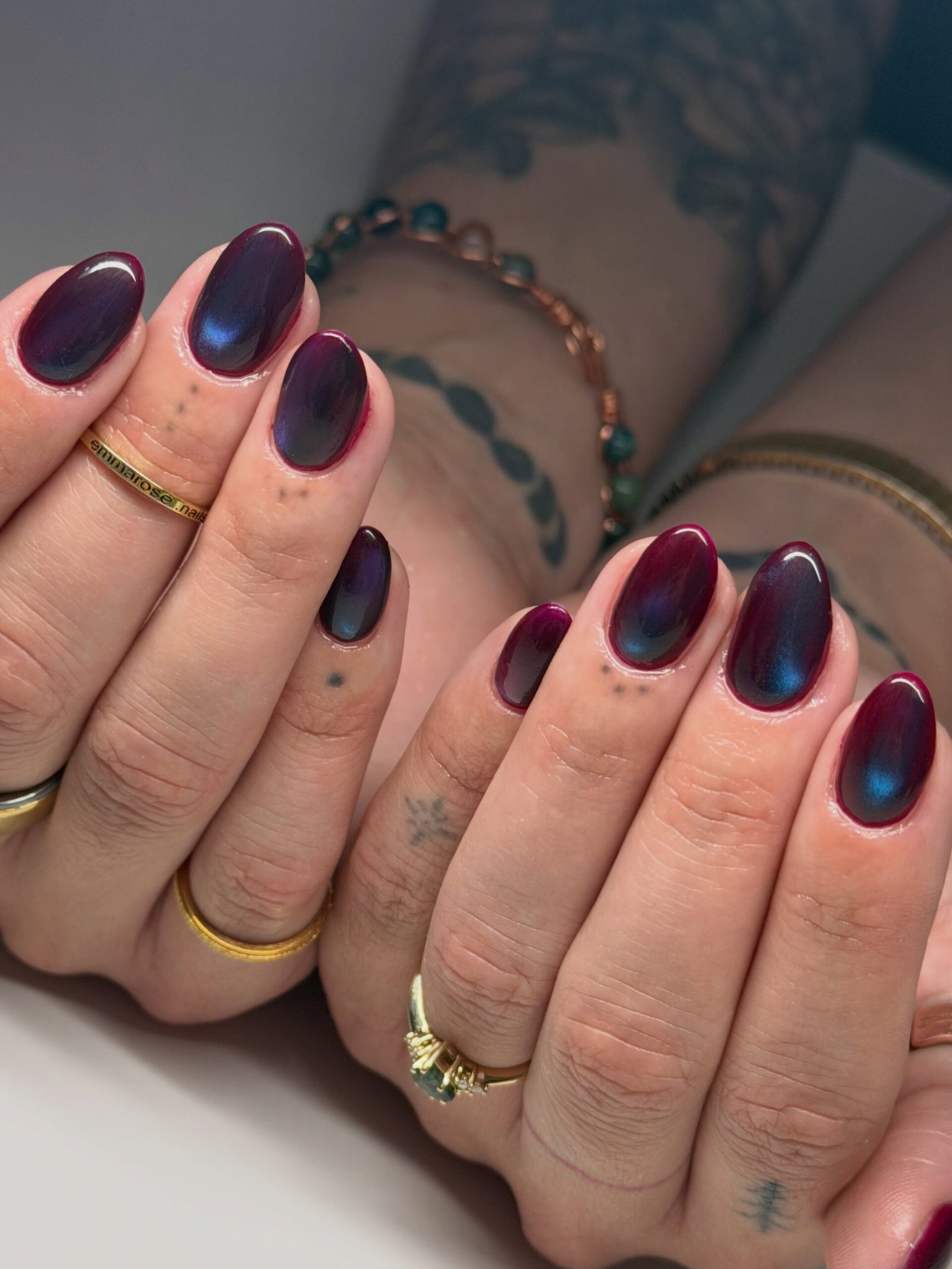 Deep Plum Nails with Blue-Toned Accents