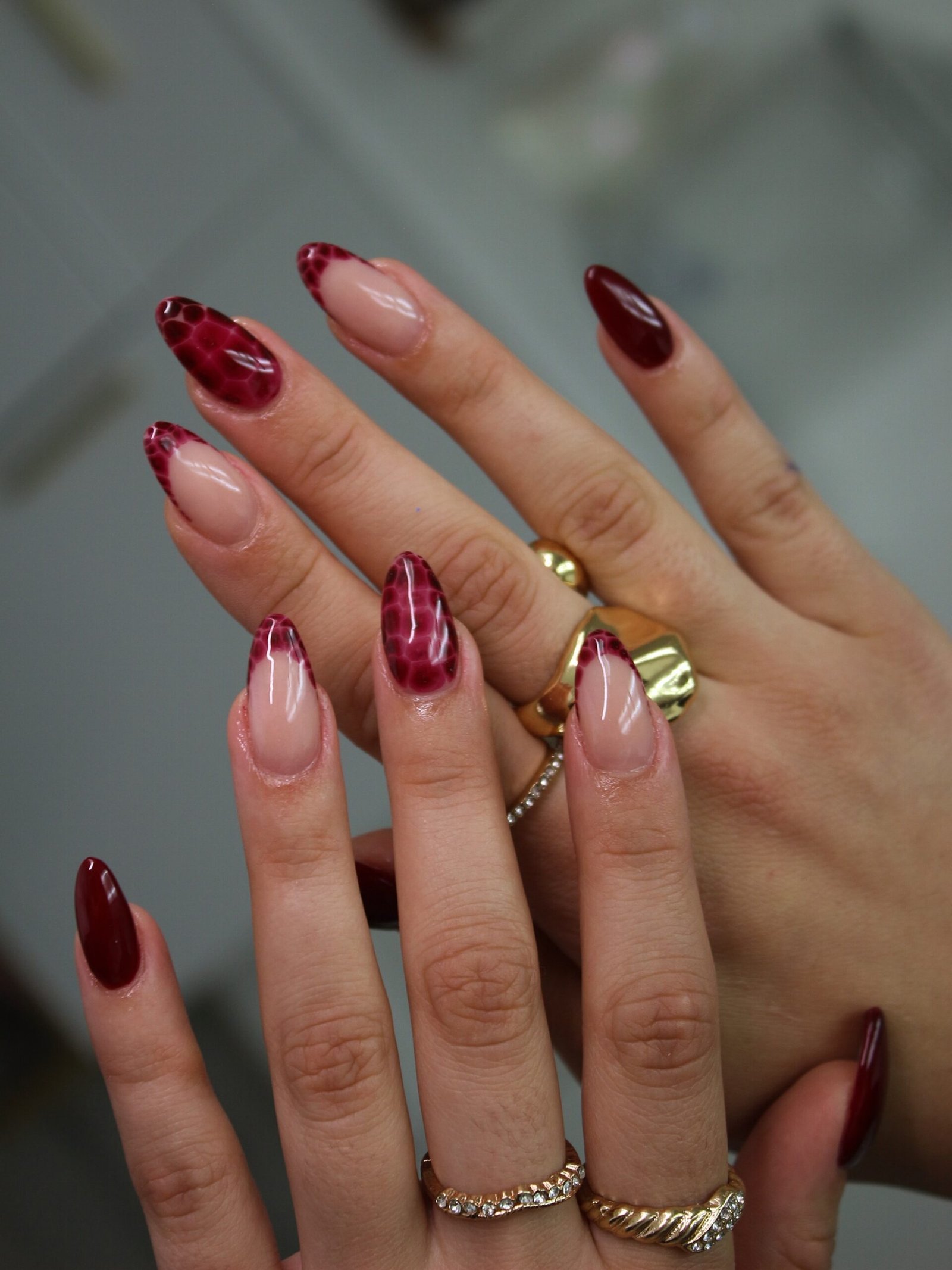 Wine and Nude Almond Nails with Fine Line Details