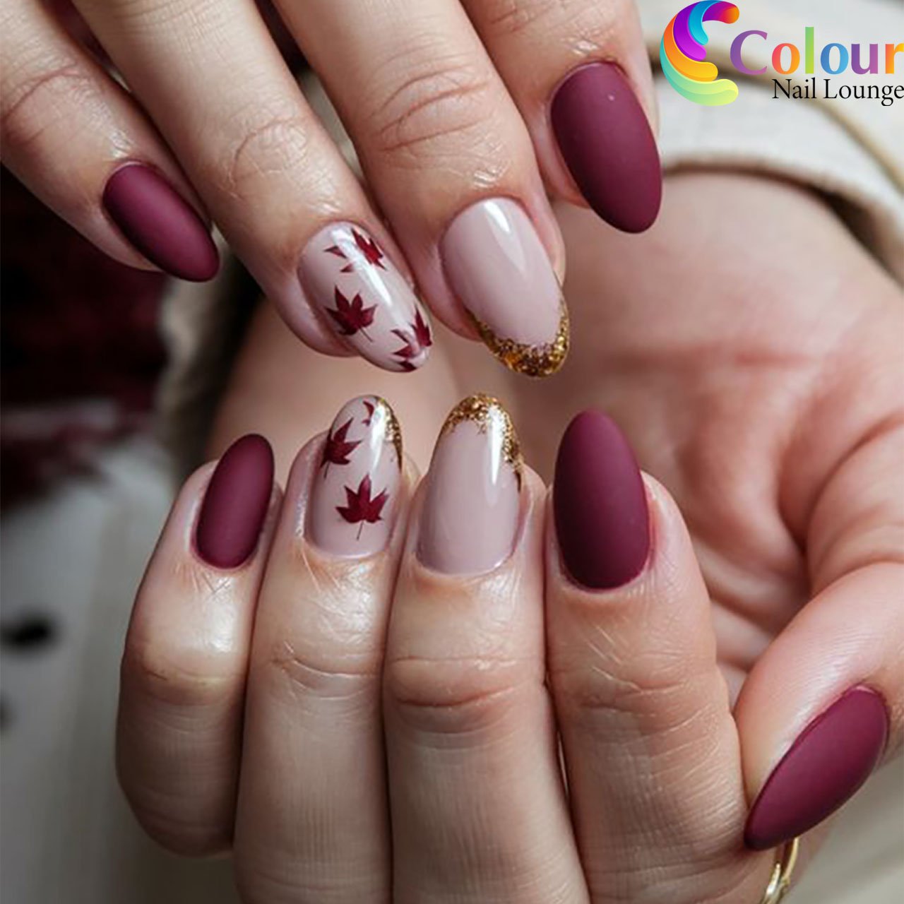 Wine and Pale Pink Almond Nails with Autumn Leaf Art