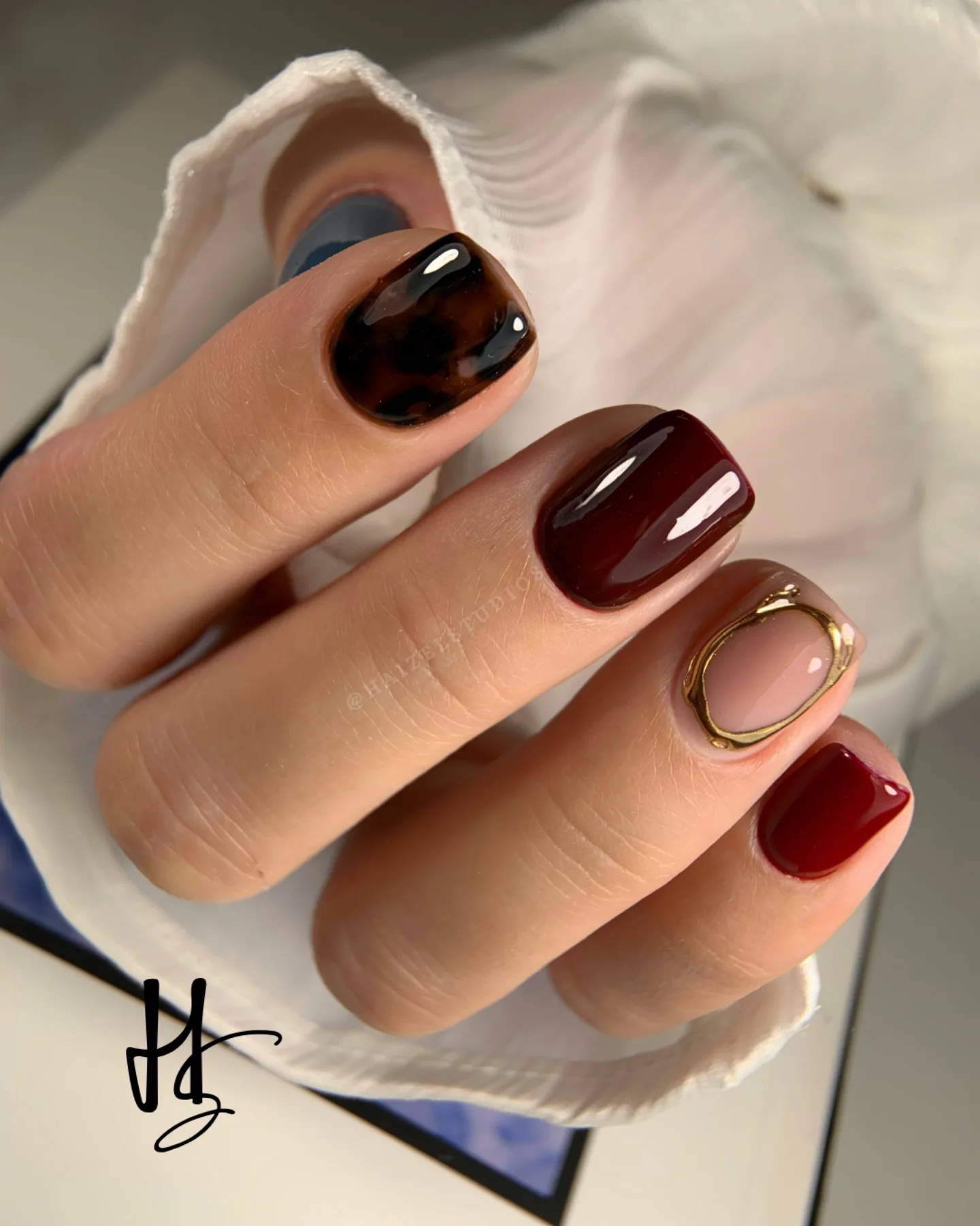 Wine, Brown, and Nude Short Square Nails with Gold Outline