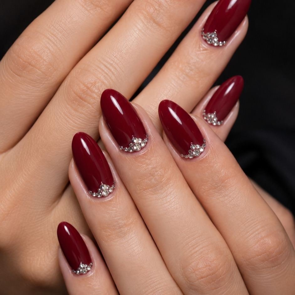 Short glossy wine nails with subtle sparkle