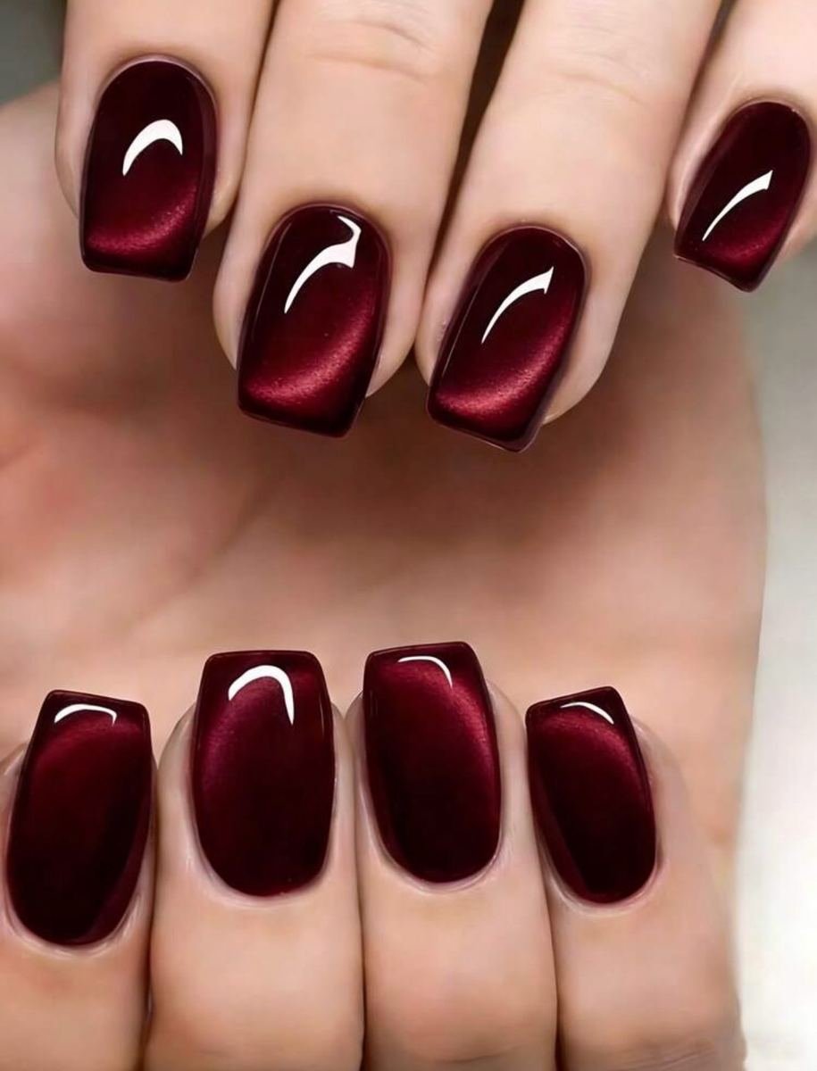 Short square wine nails with negative-space curves